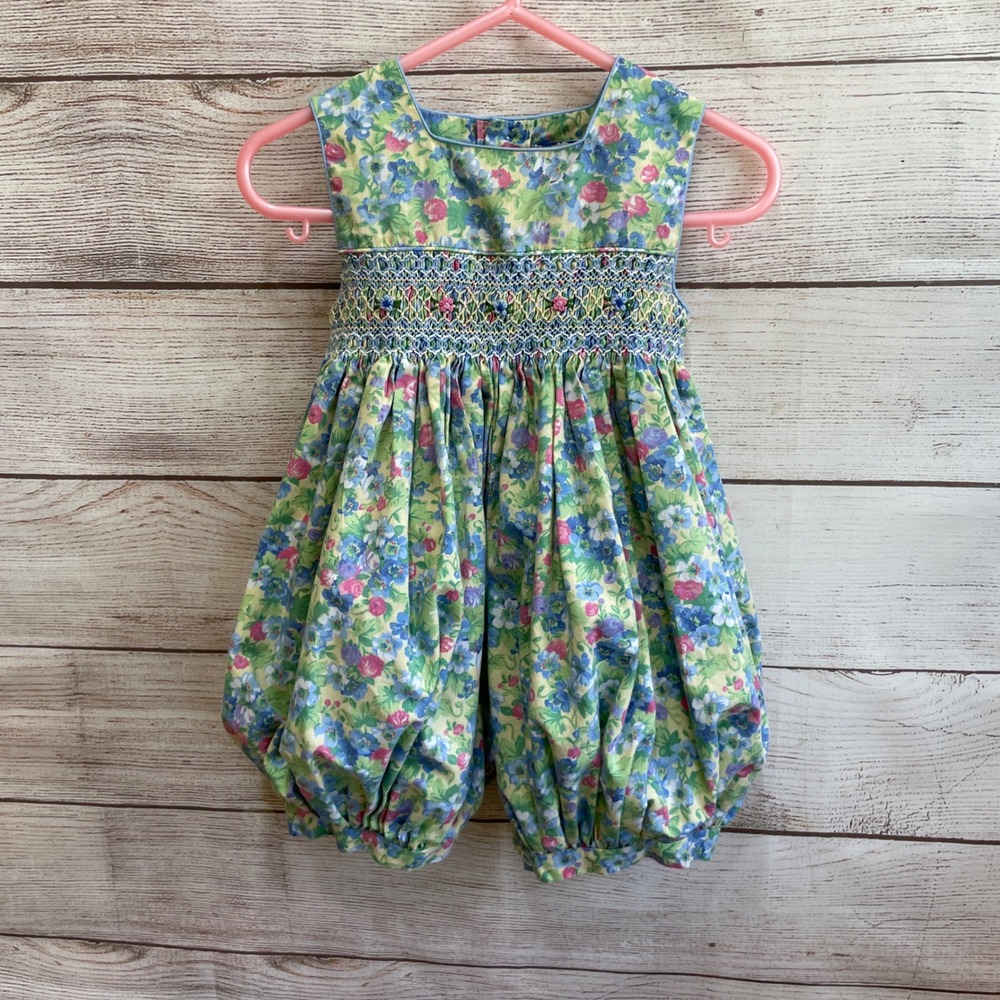 VINTAGE CARRIAGE BOUTIQUE SMOCKED FLORAL ROMPER